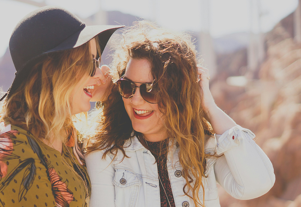 Image of two women talking and smiling