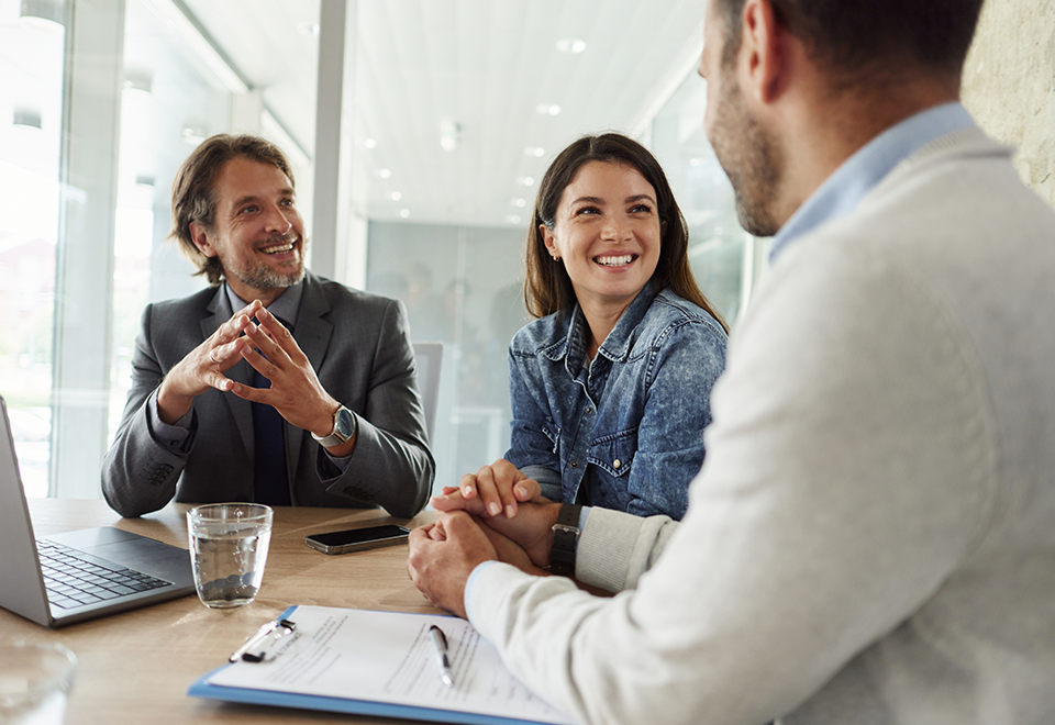 A couple meets with an advisor