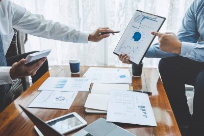 Financial planning meeting with people discussing finances